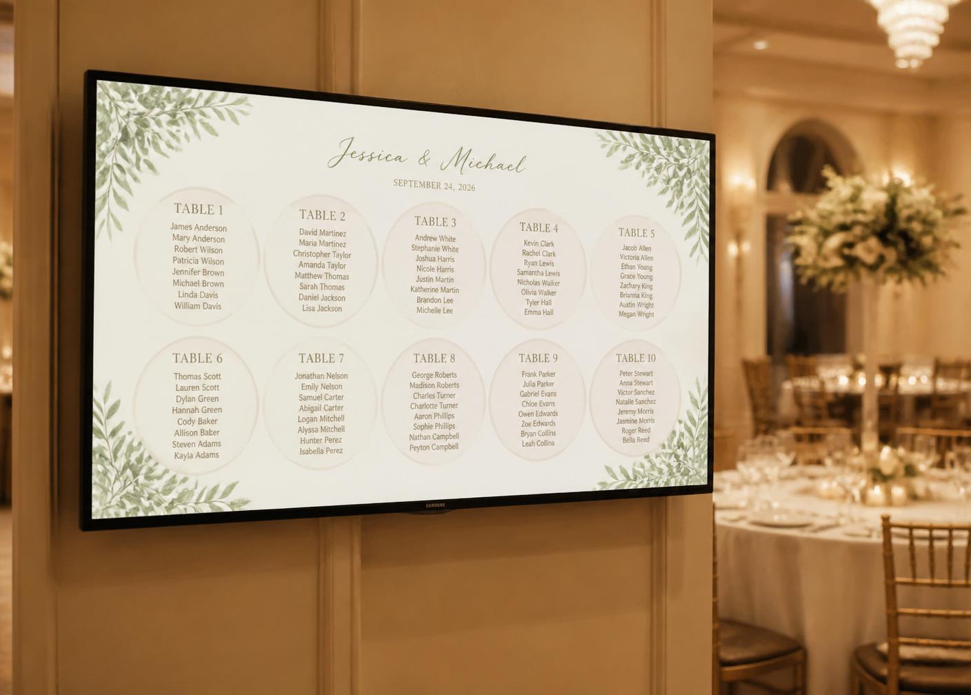 Live seating plan display shown on a wall-mounted TV at a wedding reception